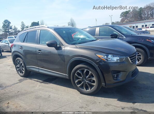 JM3KE2DY1G0859413 2016 MAZDA CX-5 Brown Vista del cuadro de instrumentos