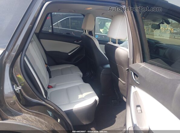 JM3KE2DY1G0859413 2016 MAZDA CX-5 Brown Vista de la etiqueta del VIN