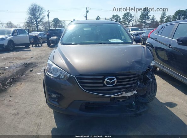 JM3KE2DY1G0859413 2016 MAZDA CX-5 Brown Vista del salpicadero