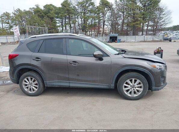 JM3KE4CY3G0630194 2016 MAZDA CX-5 Dark Brown Вид задней части салона