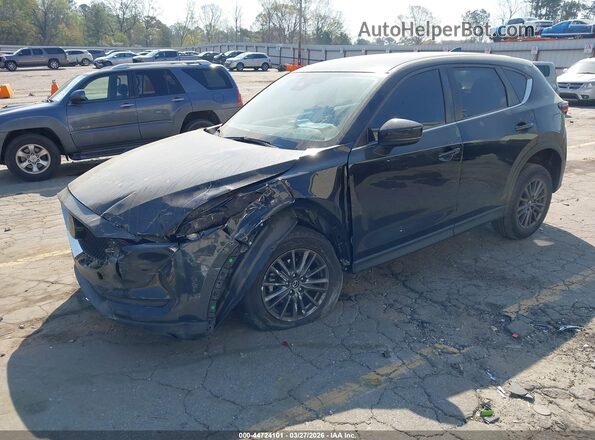 JM3KFBBM5M0381280 2021 MAZDA CX-5 Gray Vista tres cuartos delantera izquierda