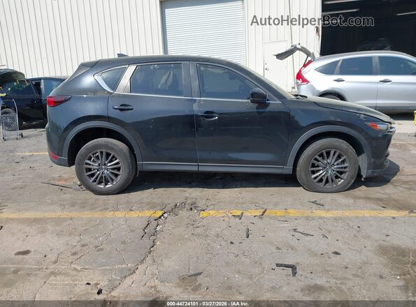 JM3KFBBM5M0381280 2021 MAZDA CX-5 Gray Vista interior trasera