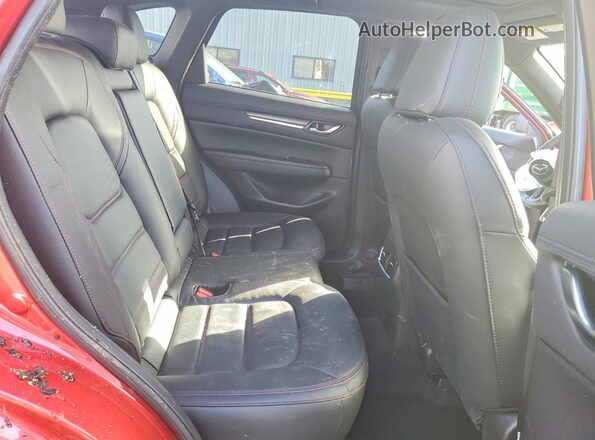 JM3KFBDY9S0632007 2025 MAZDA CX-5 Maroon Vista de los asientos traseros
