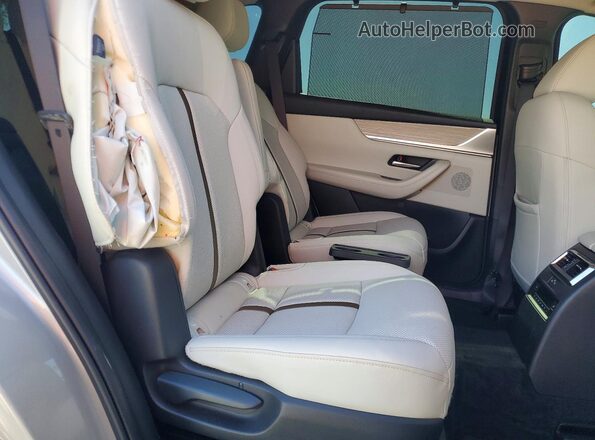 JM3KKDHC6S1205285 2025 MAZDA CX-90 Beige Rear interior view