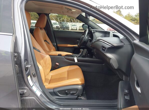 JTHU9JBH4K2004915 2019 LEXUS UX 250H Gray Vista interior delantera