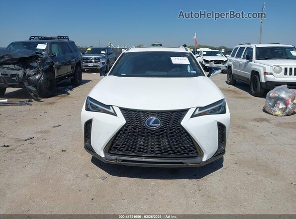 JTHU9JBH6K2014846 2019 LEXUS UX 250H Белый Вид щитка приборов