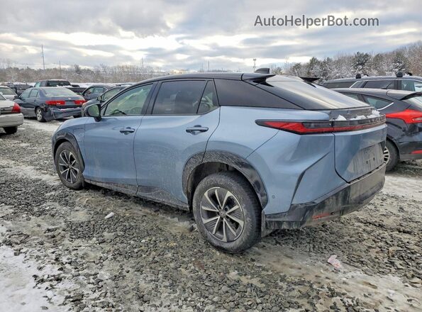 JTJAAAAB2PA011882 2023 LEXUS RZ Blue Trasero izquierdo