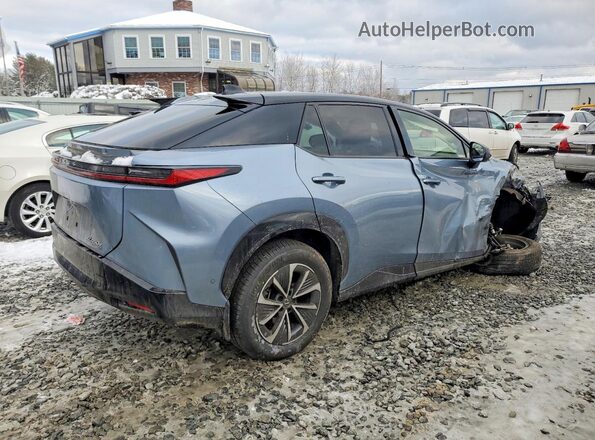 JTJAAAAB2PA011882 2023 LEXUS RZ Blue Trasero derecho