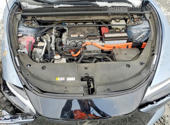 JTJAAAAB2PA011882 2023 LEXUS RZ Blue Vista del compartimento del motor