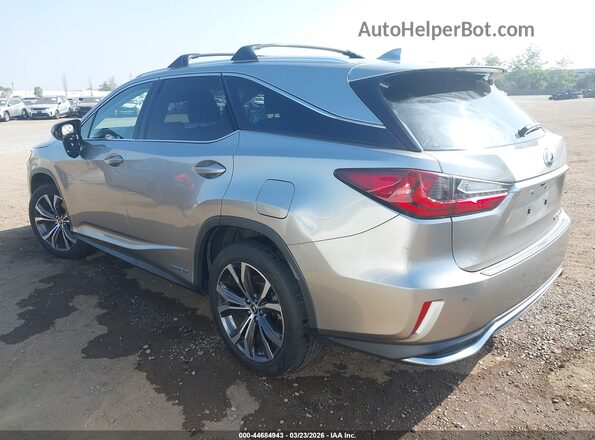 JTJDGKCA1J2002193 2018 LEXUS RX 450HL Silver Trasero izquierdo