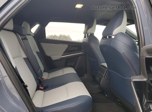 JTMABABA9RA085387 2024 SUBARU SOLTERRA Blue Սալոնի հետևի տեսք