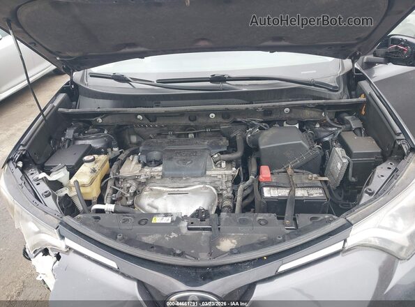 JTMBFREV3JJ235732 2018 TOYOTA LE Gray Rear view