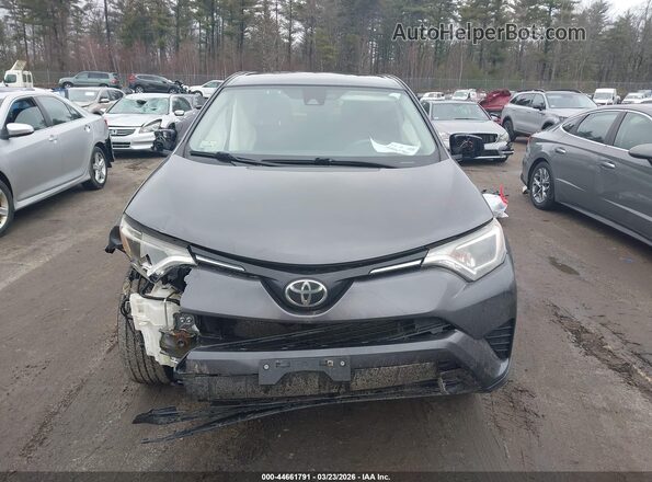 JTMBFREV3JJ235732 2018 TOYOTA LE Gray Rear interior view