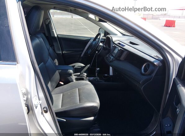 JTMDJREV6GD010848 2016 TOYOTA LIMITED Silver Front interior view