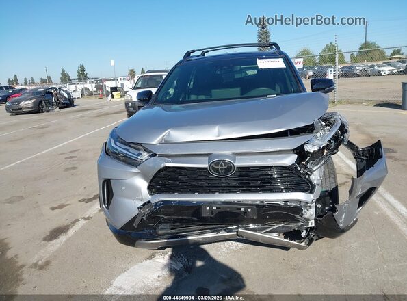 JTME6RFV5SD577162 2025 TOYOTA RAV4 HYBRID Silver Rear interior view
