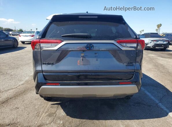 JTME6RFV8PJ031352 2023 TOYOTA RAV4 Серый Вид сзади