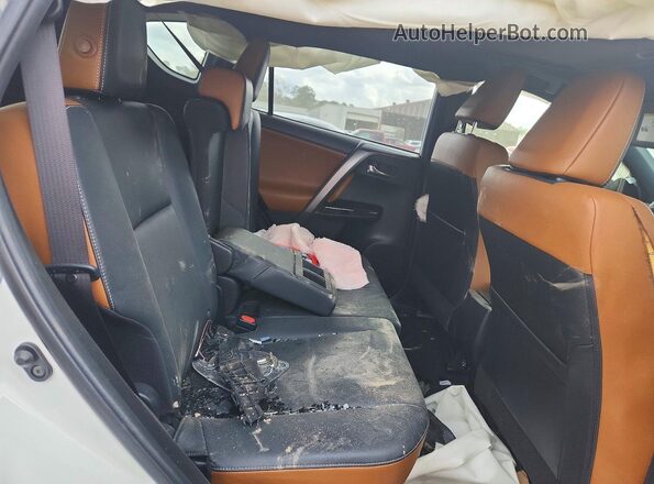 JTMNFREVXGJ090078 2016 TOYOTA RAV4 White Սալոնի հետևի տեսք