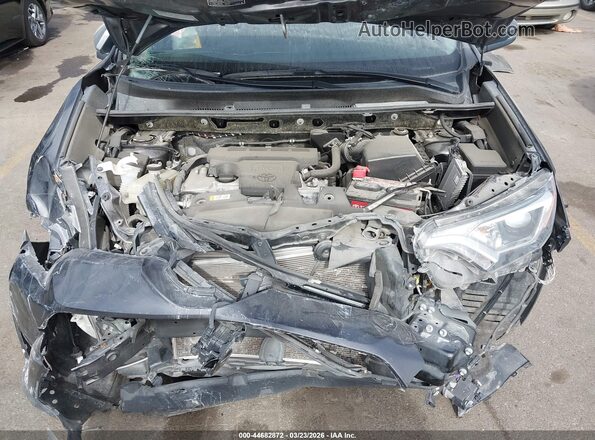 JTMRFREV2JJ252780 2018 TOYOTA LE Gray Հետևի տեսք