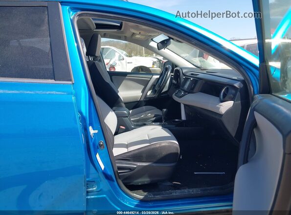 JTMRFREVXGD190066 2016 TOYOTA LE Blue Вид салону спереду
