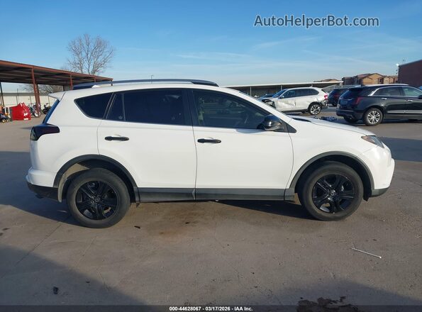 JTMZFREVXJJ206825 2018 TOYOTA LE White Rear interior view
