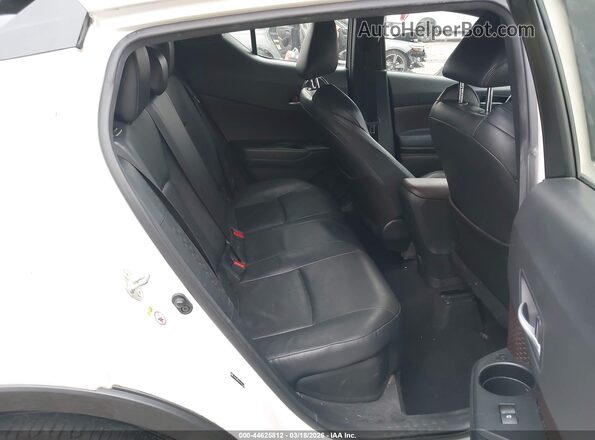 JTNKHMBX5K1052168 2019 TOYOTA LIMITED White VIN կոդի պիտակի տեսք