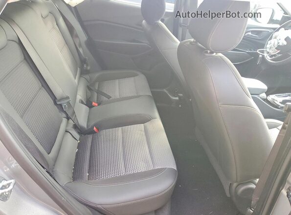 KL77LHE20RC054499 2024 CHEVROLET TRAX Charcoal Widok wnętrza z tyłu