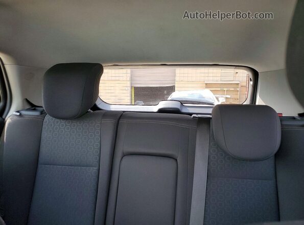 KL7CJKSBXMB339702 2021 CHEVROLET TRAX White Vista de los asientos traseros