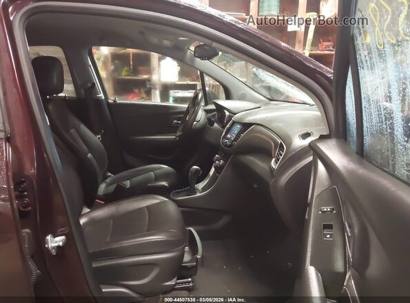 KL7CJPSM2MB369694 2021 CHEVROLET TRAX Maroon Vista interior delantera