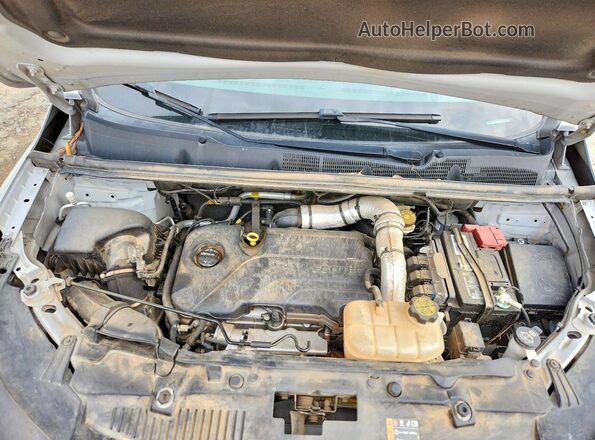 KL7CJPSM7NB542501 2022 CHEVROLET TRAX Silver Rear interior view