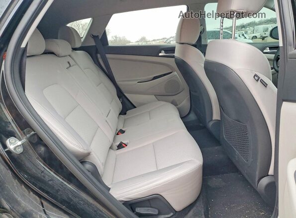 KM8J33A46MU318679 2021 HYUNDAI TUCSON Black Widok wnętrza z tyłu