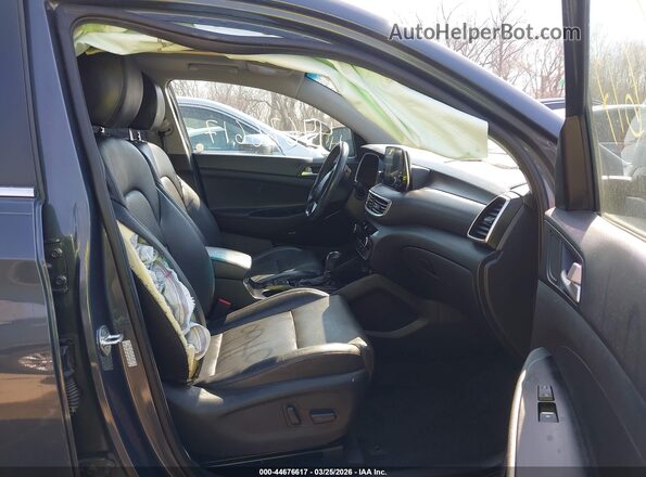KM8J33AL6MU410317 2021 HYUNDAI TUCSON Gray Vista interior delantera