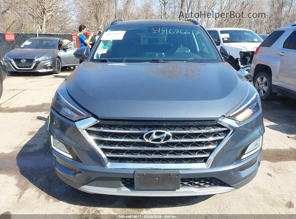 KM8J33AL6MU410317 2021 HYUNDAI TUCSON Gray Vista interior trasera
