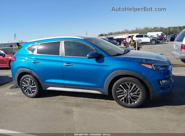 KM8J33ALXMU325738 2021 HYUNDAI TUCSON Blue Vista interior trasera