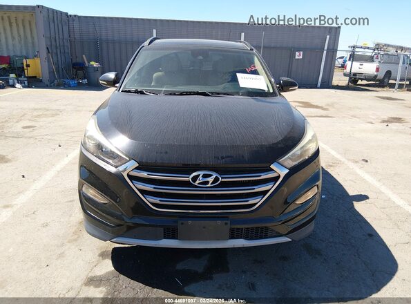 KM8J3CA28JU651007 2018 HYUNDAI TUCSON Черный Вид задней части салона