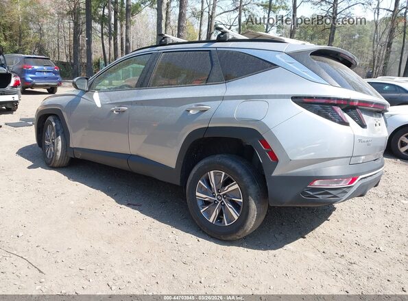 KM8JBCA19NU079316 2022 HYUNDAI TUCSON HYBRID Silver Trasero izquierdo