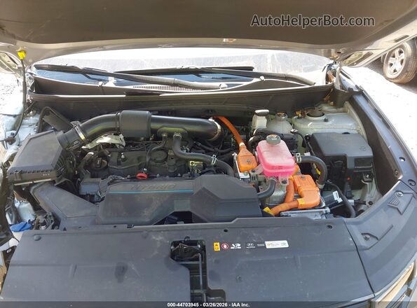 KM8JBCA19NU079316 2022 HYUNDAI TUCSON HYBRID Silver Vista trasera