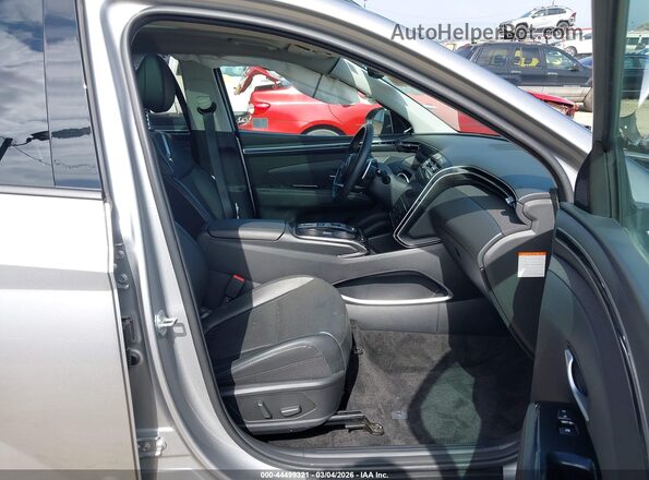 KM8JECD18RU235810 2024 HYUNDAI TUCSON HYBRID Silver წინა სალონის ხედი