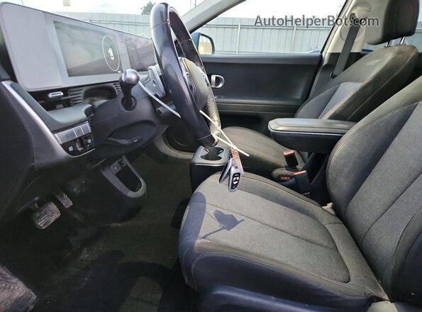 KM8KMDAF1PU121643 2023 HYUNDAI IONIQ Teal Widok wnętrza z przodu