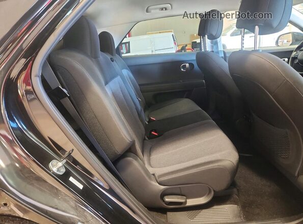 KM8KMDAF6PU135800 2023 HYUNDAI IONIQ Black Вид задньої частини салону