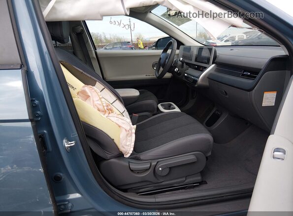 KM8KNDDF1RU339268 2024 HYUNDAI IONIQ 5 Blue Front interior view