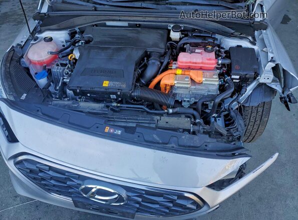 KMHC65LC1NU273412 2022 HYUNDAI IONIQ Серебряный Вид задней части салона