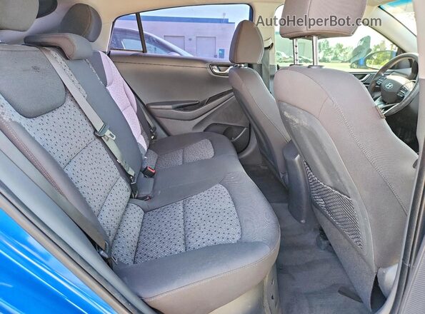 KMHC65LC5JU061056 2018 HYUNDAI IONIQ Blue Հետևի նստատեղերի տեսք