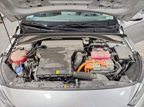 KMHC65LCXMU257739 2021 HYUNDAI IONIQ Silver Widok wnętrza z tyłu