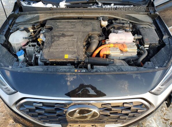 KMHC65LD1MU261591 2021 HYUNDAI IONIQ Black Widok wnętrza z tyłu