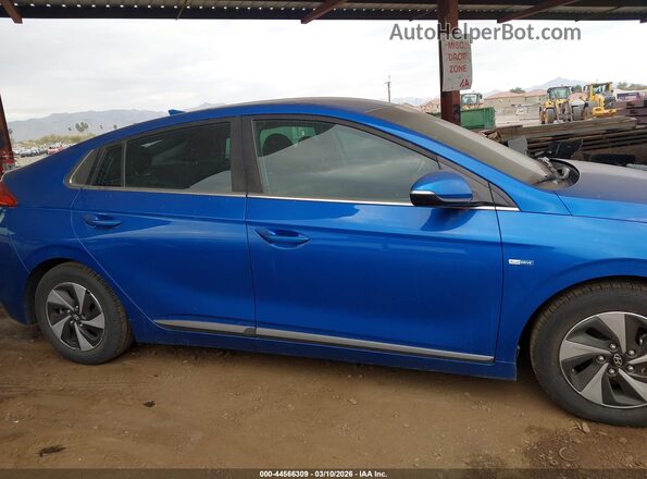 KMHC75LC0JU072916 2018 HYUNDAI IONIQ HYBRID Blue Rear interior view