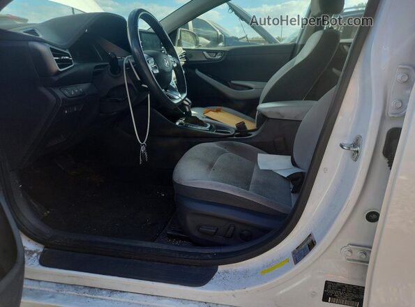 KMHC75LC8MU248549 2021 HYUNDAI IONIQ White წინა სალონის ხედი