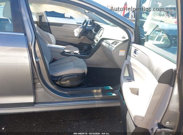 KMHE24L38KA084526 2019 HYUNDAI SONATA HYBRID Silver წინა სალონის ხედი