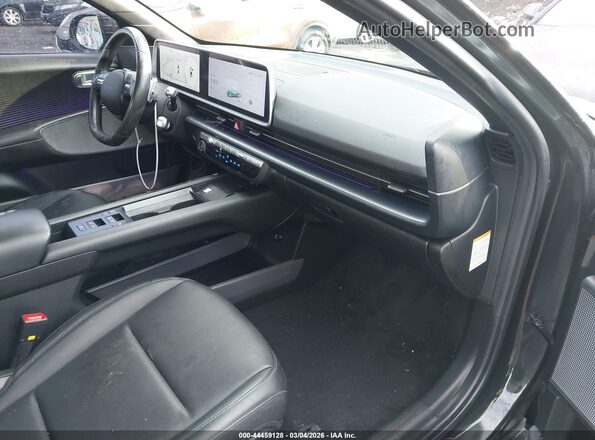 KMHM34AA3PA037731 2023 HYUNDAI IONIQ 6 Черный Вид салона спереди