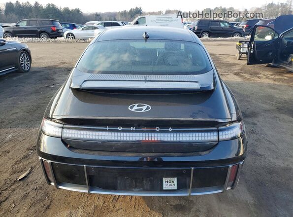 KMHM34AC9PA030137 2023 HYUNDAI IONIQ Black უკანა ხედი