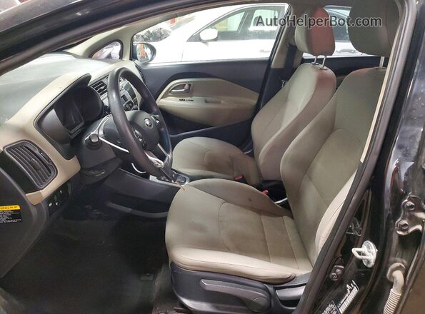 KNADM4A34H6012017 2017 KIA RIO Black Вид салону спереду